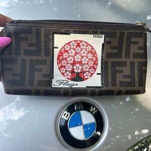 Beautiful authentic Rare Fendi Flags clutch.